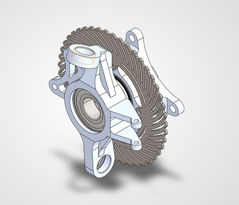 SolidWorks render of an upright assembled with a bearing and a slotted brake rotor