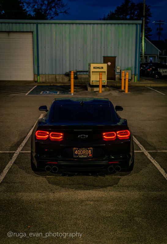 Black Camaro at dusk