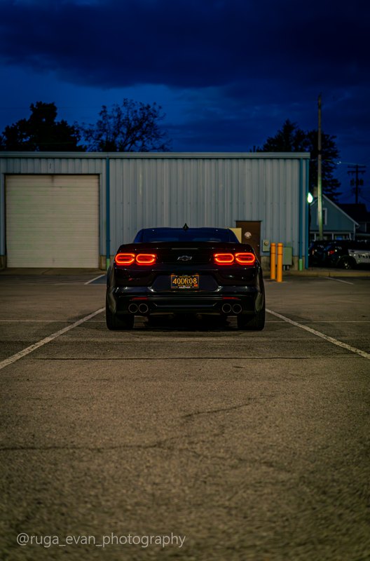 Black Camaro at dusk