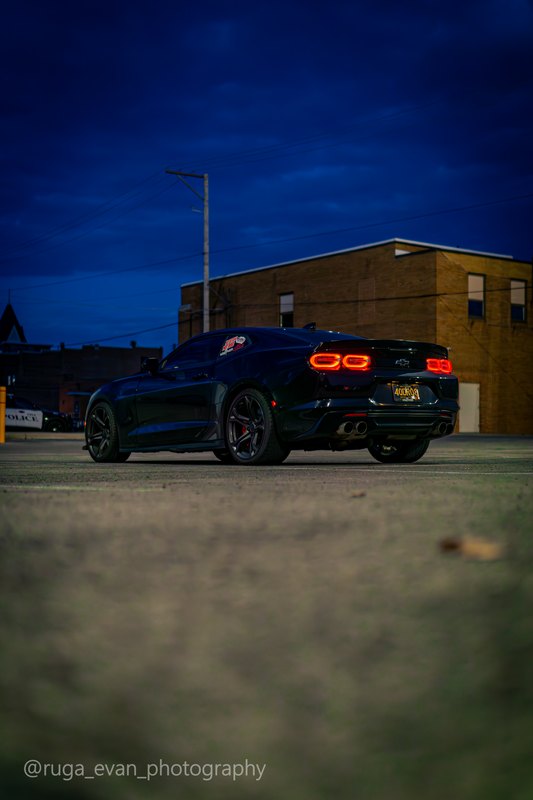 Black Camaro at dusk