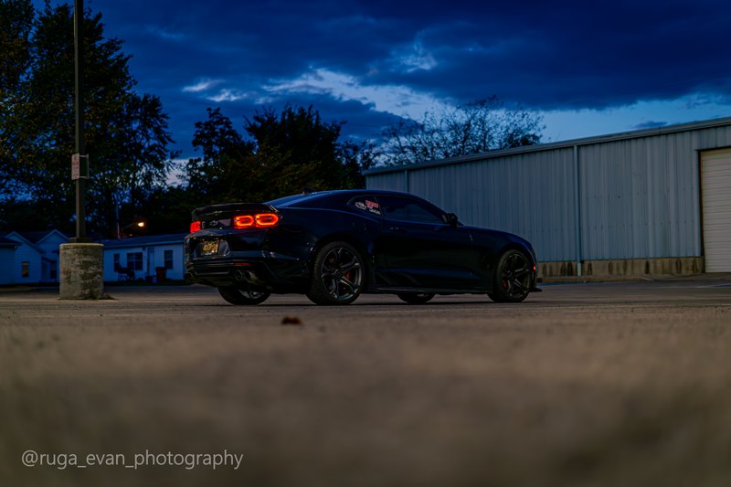 Black Camaro at dusk