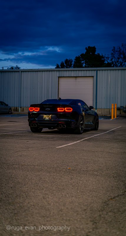 Black Camaro at dusk