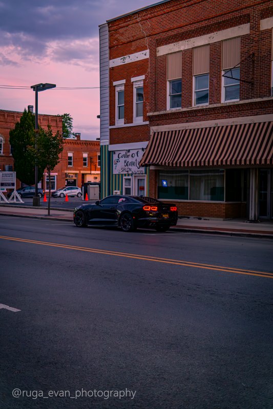 Black Camaro at dusk