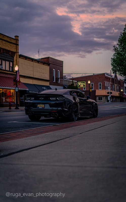 Black Camaro at dusk